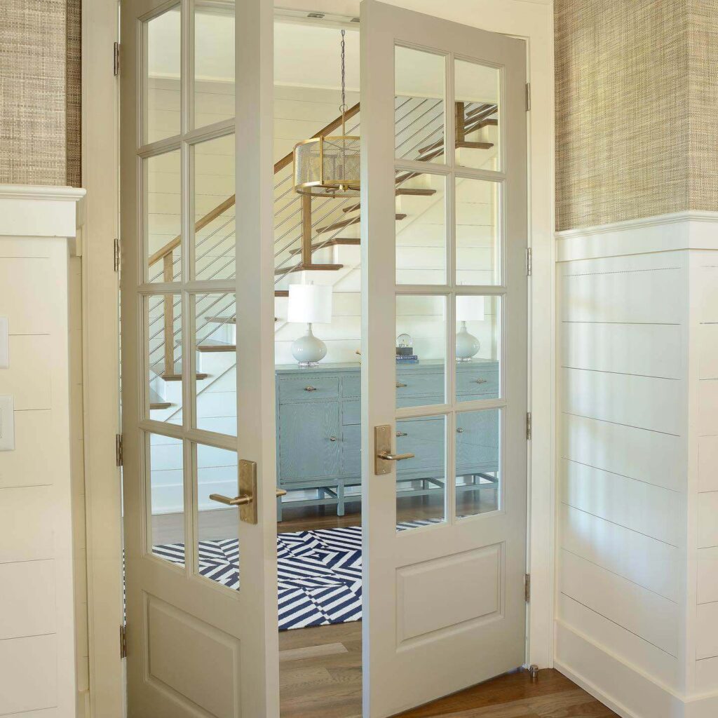 1. Modern Industrial Glass Door with Black Grid Frame
