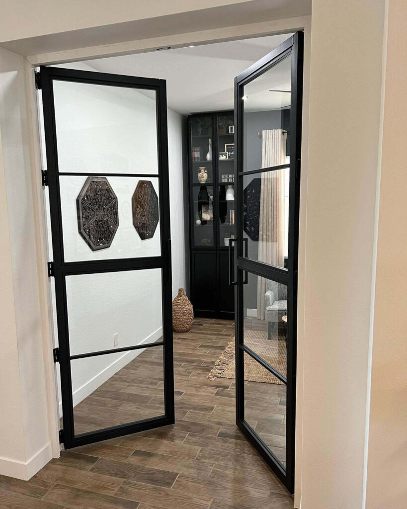 11. Contemporary Black Framed Doors with Custom Insets