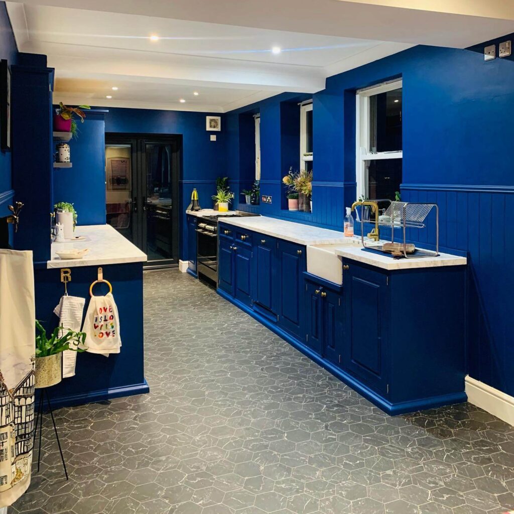 13. Blue Marble Accents in a Transitional Kitchen