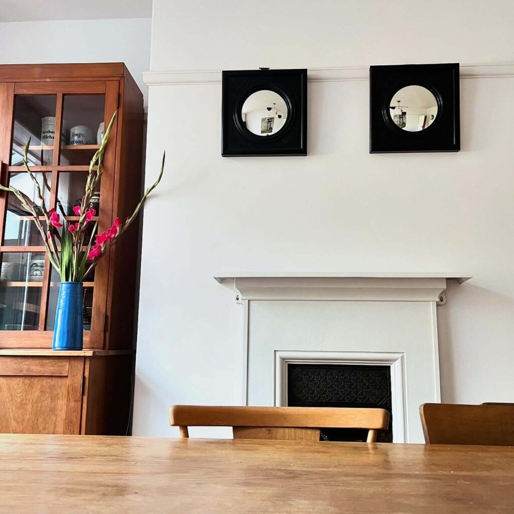 14. Geometric Wall Mirrors to Expand and Reflect