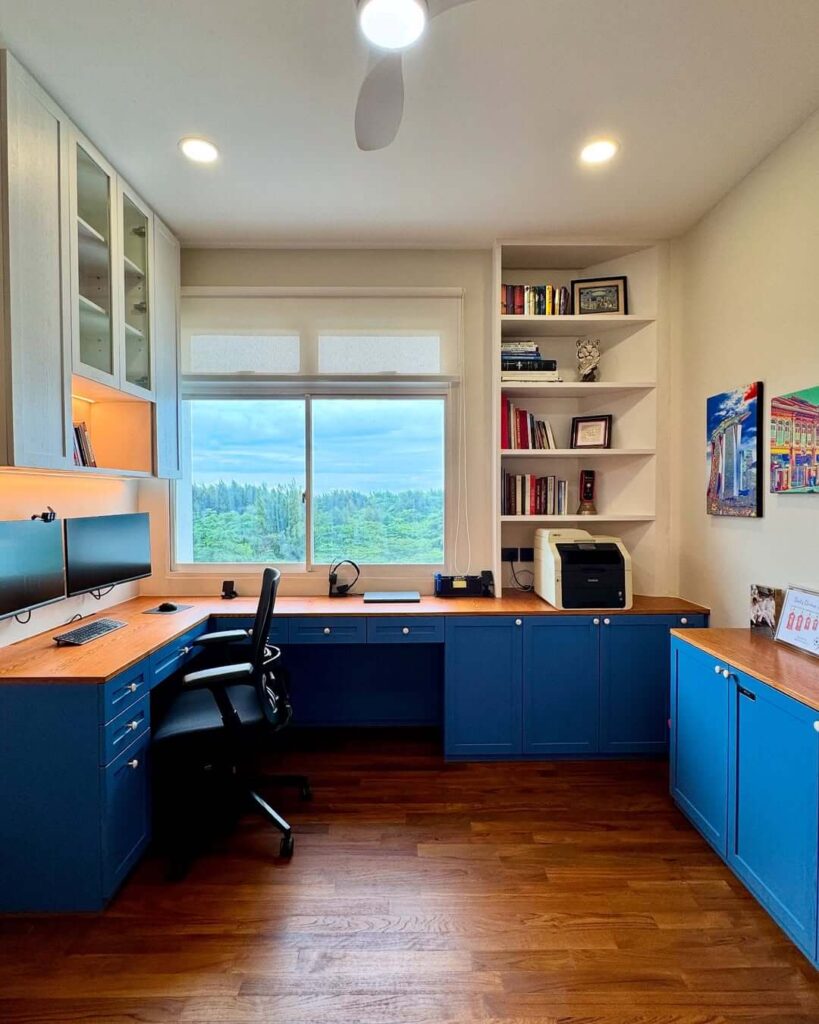 15. Charming Cottage Office with Soft Blue Tones