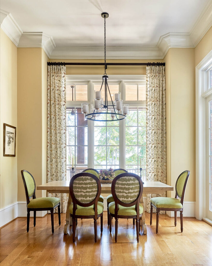 25. Traditional Comfort with a Cozy Bay Window Nook