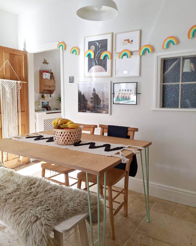 26. Turn a Corner into a Gallery-Style Dining Nook