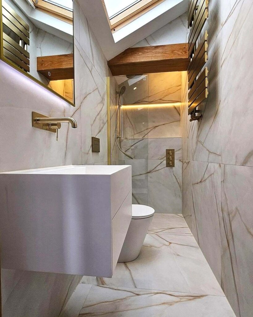 27. Seamless Marble-Effect Tile in Sloped Spaces