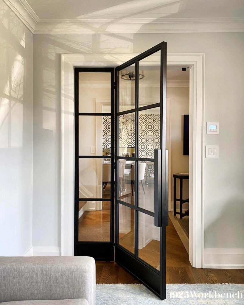 3. Double Swing Glass Doors with Grid Detailing