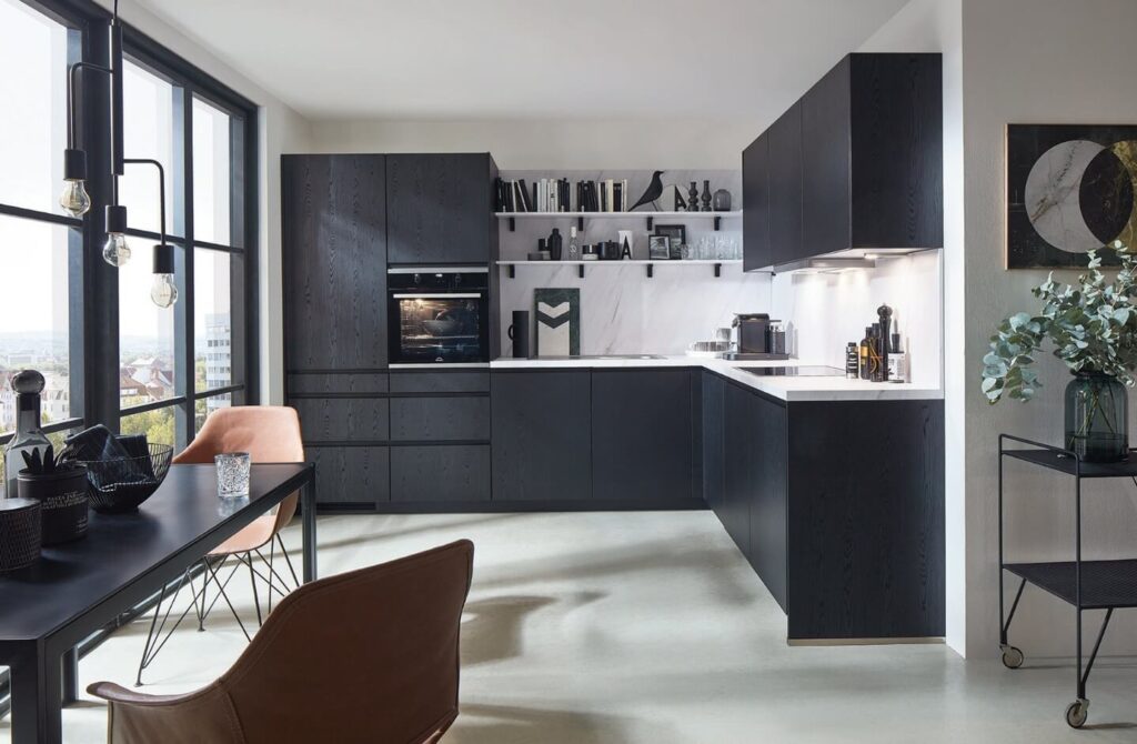 3. Bold Contrasts with Brass and Black