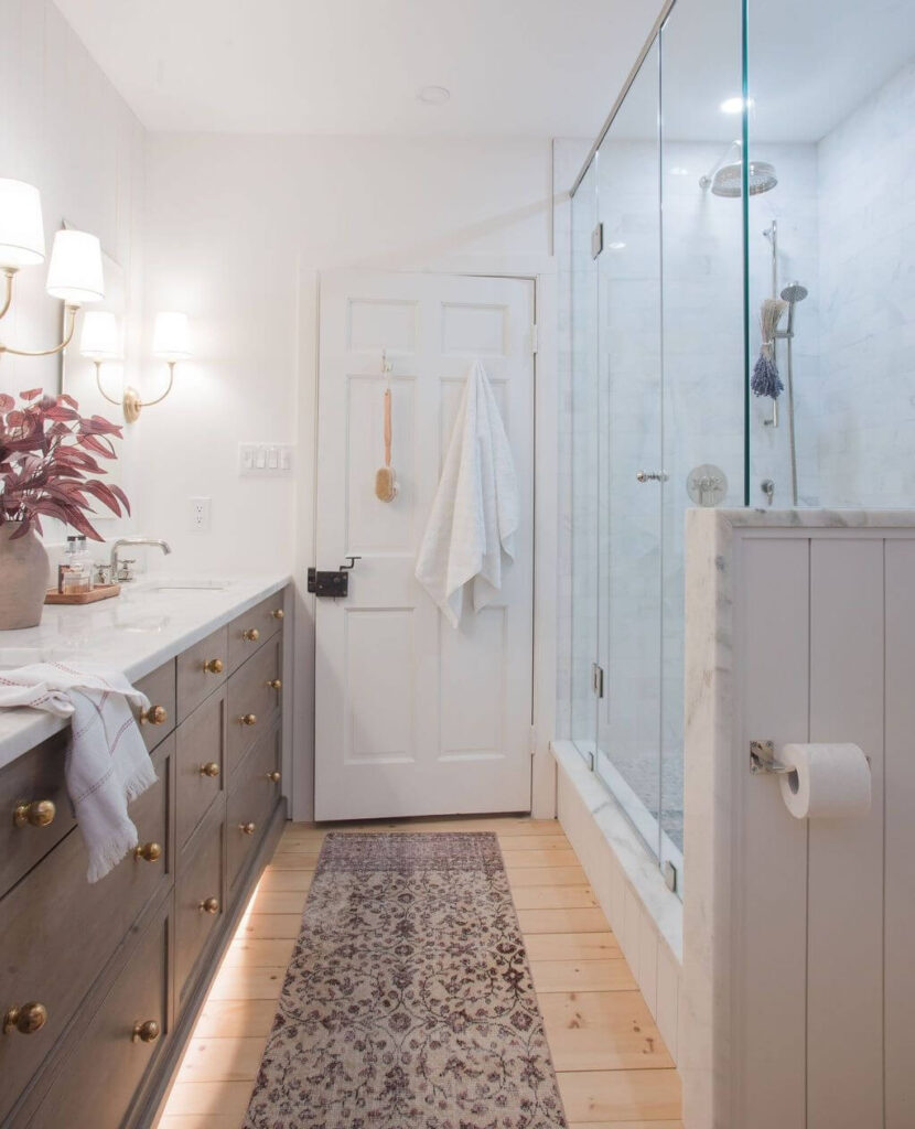 3. Freestanding Tub Against a Marble Feature Wall