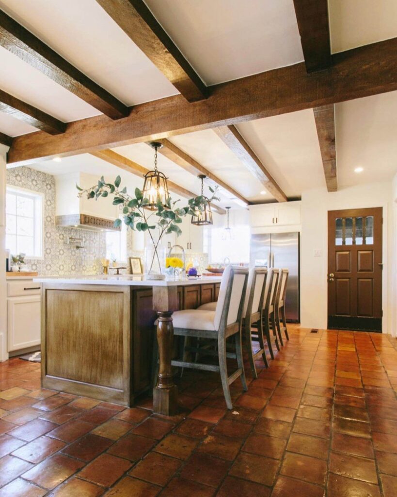 4. Timeless Elegance: Brick Arches and Carved Wood Details