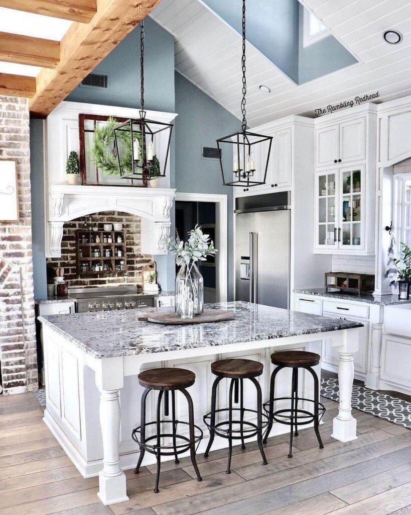 6. Brick Archways and Layered Neutrals in a Cozy Kitchen Nook