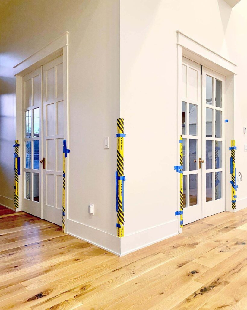 7. White Sliding French Doors for Subtle Sophistication