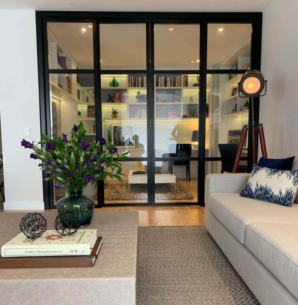 8. Full-View Glass Panel Doors with Minimal Black Hardware