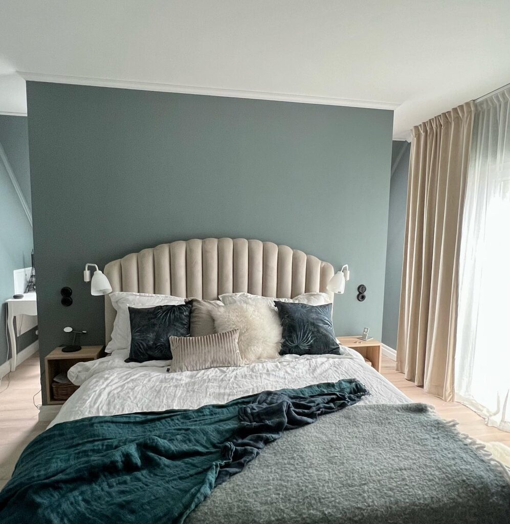 1. Dusty Blue Walls with Earthy Accents