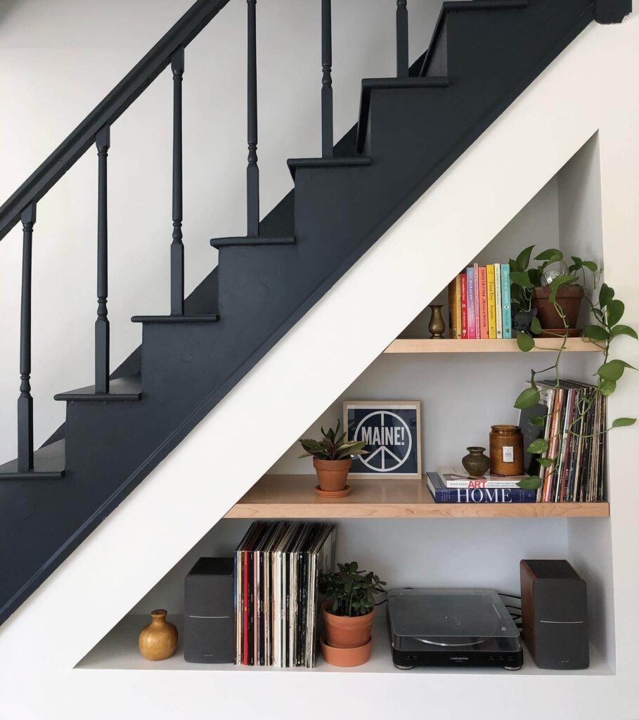 12. Under-Stair Bookshelf with Personal Touch