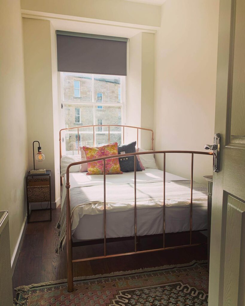 13. Choose a Narrow Bed Frame to Maximize Walking Space