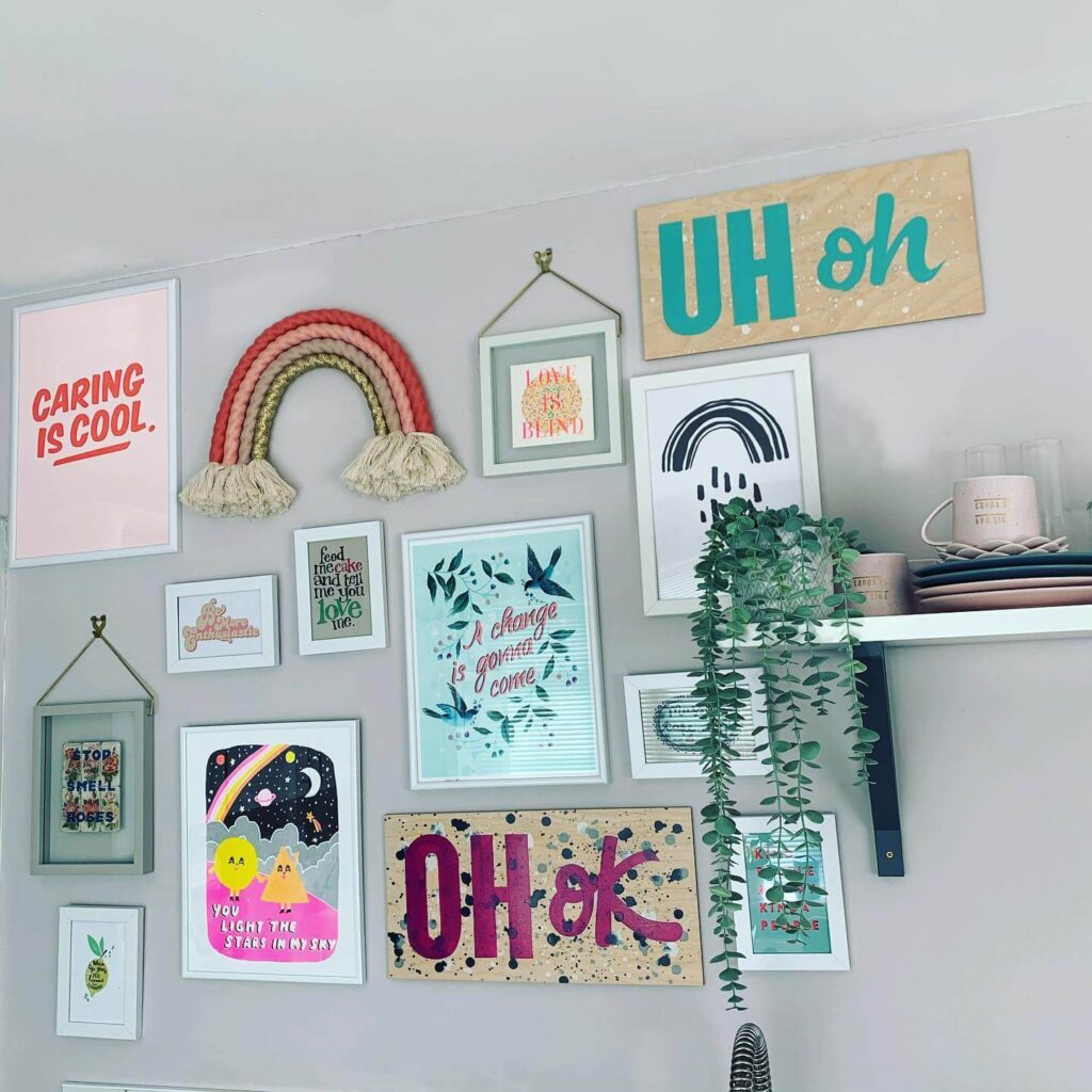 16. Asymmetrical Art Wall in a Vaulted Living Room