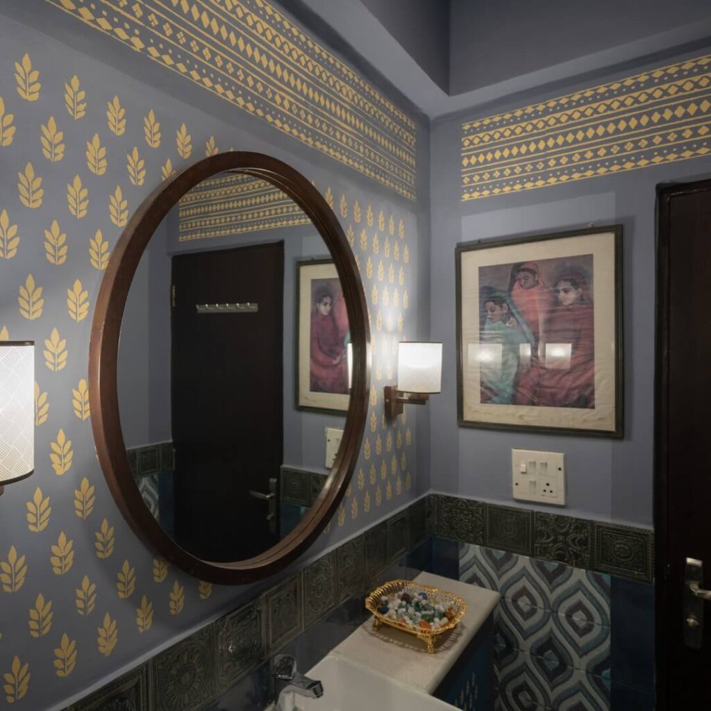 16. Traditional Stencil Art for a Timeless Bathroom