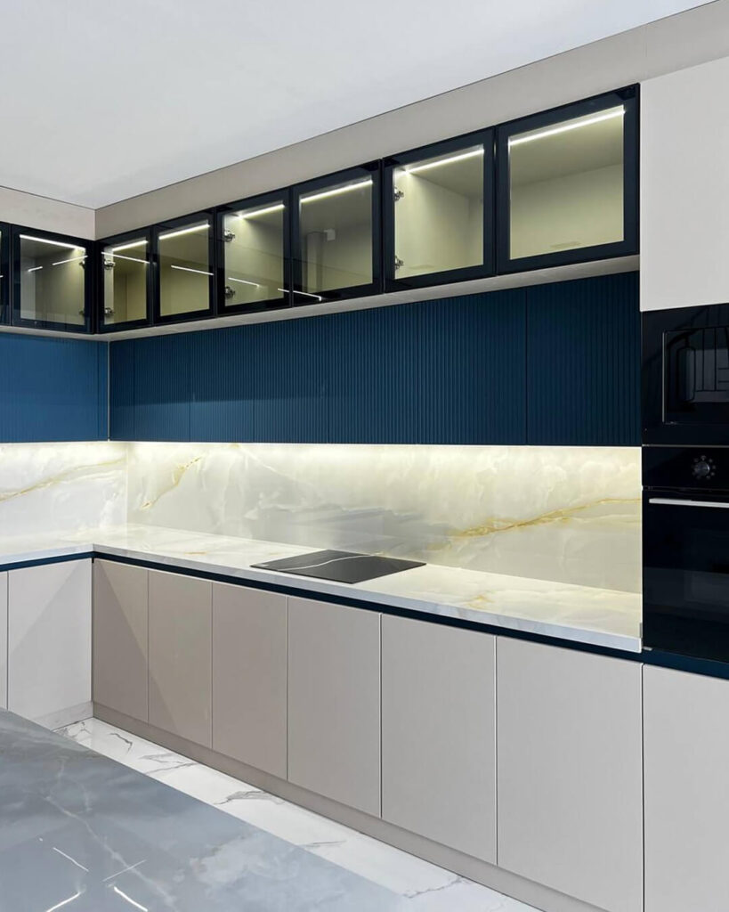17. Fluted Paneling in Bold Kitchens