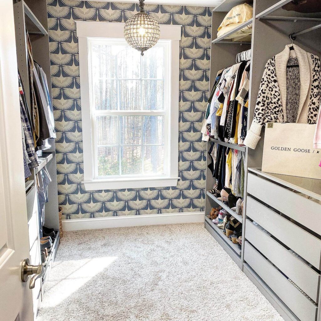18. Boutique-Inspired Closet with Center Island