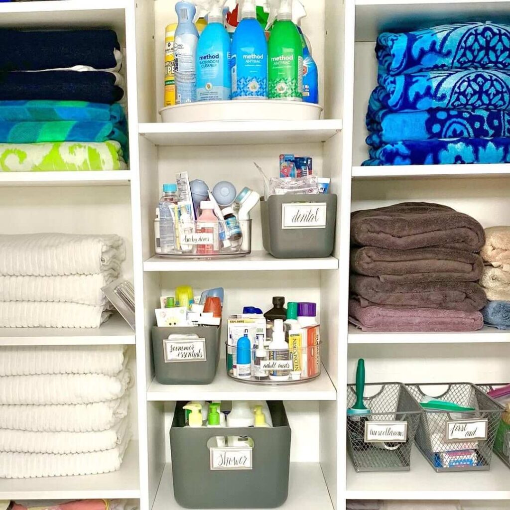 2. Maximize Vertical Storage in a Linen Closet with Turntables and Totes