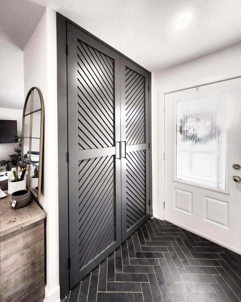 2. Powder Blue Paneled Doors with Decorative Molding