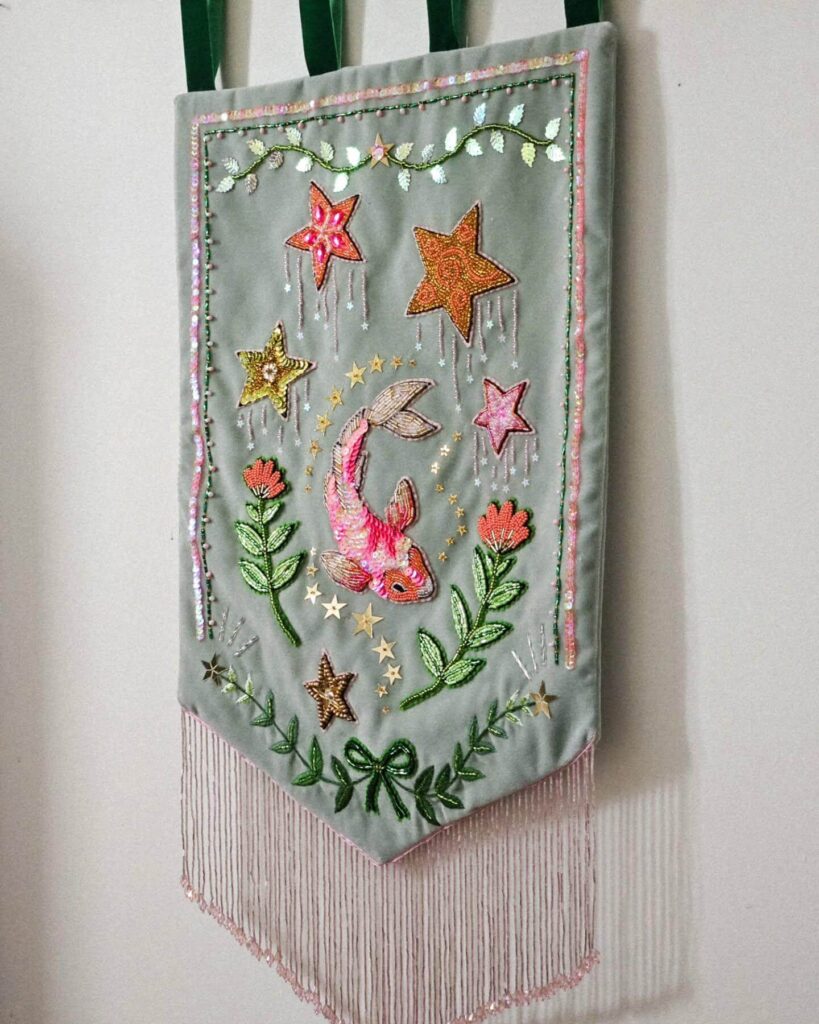 2. Embroidered Banners That Tell a Story