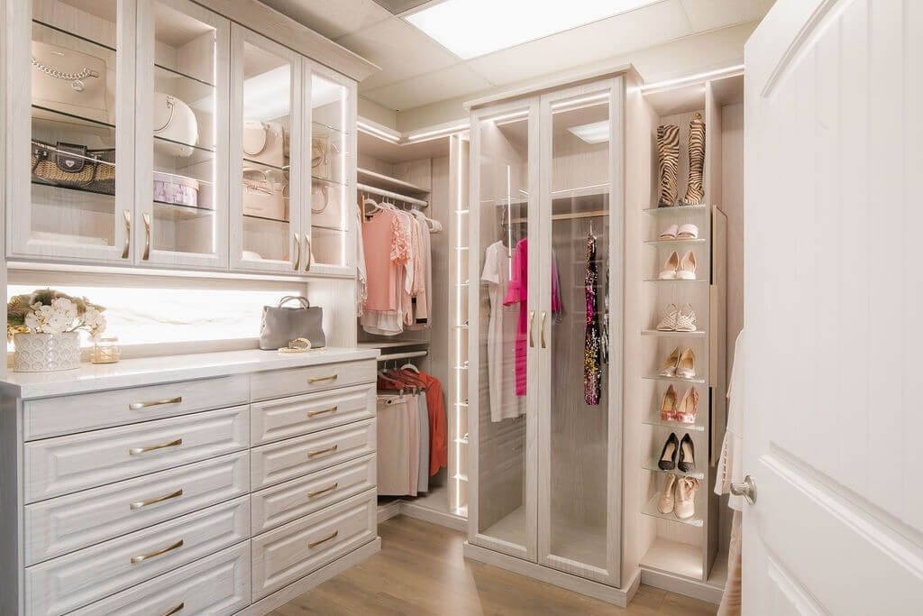 21. Use Glass Elements for a Glamorous, Boutique Feel