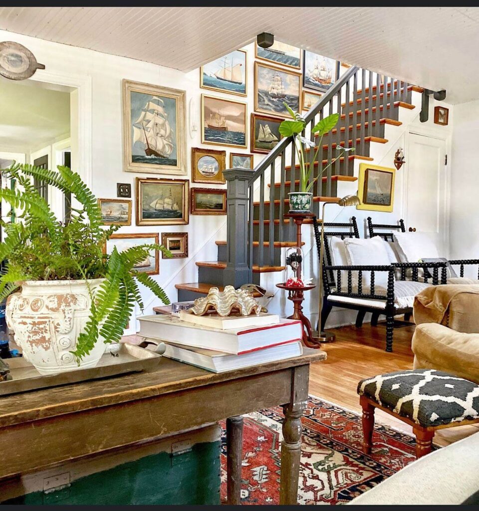 21. Modern Staircase Gallery with a Monochrome Palette