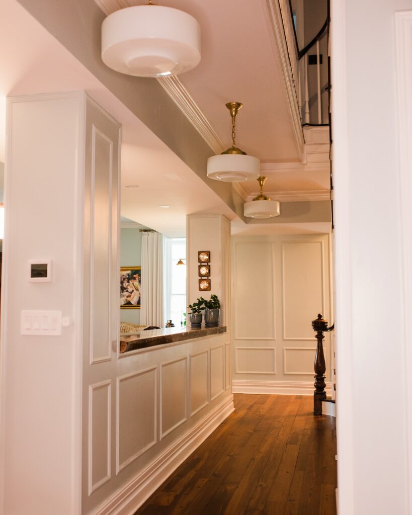 21. Moody Green Panels with Vintage Accents