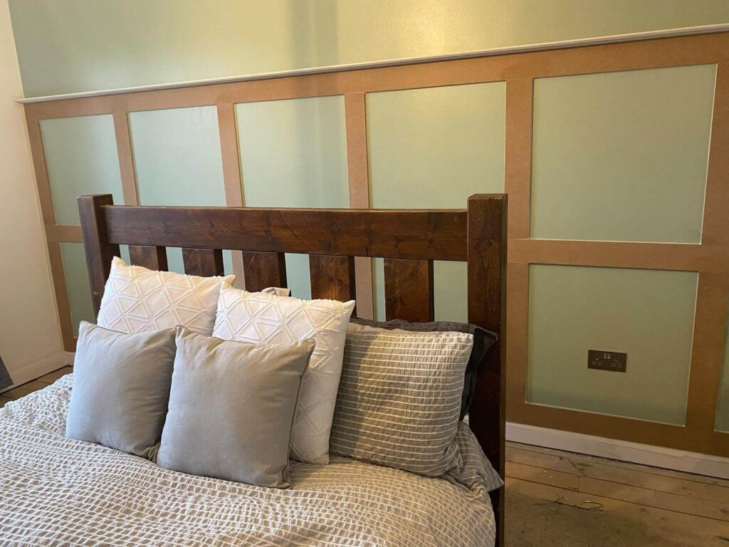 22. Frame Your Sage with Natural Wood Tones