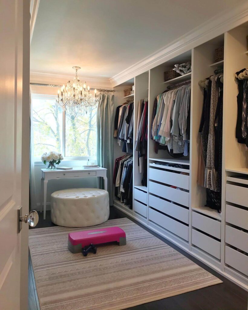 22. Sleek Walk-In with LED Accents and Shoe Wall