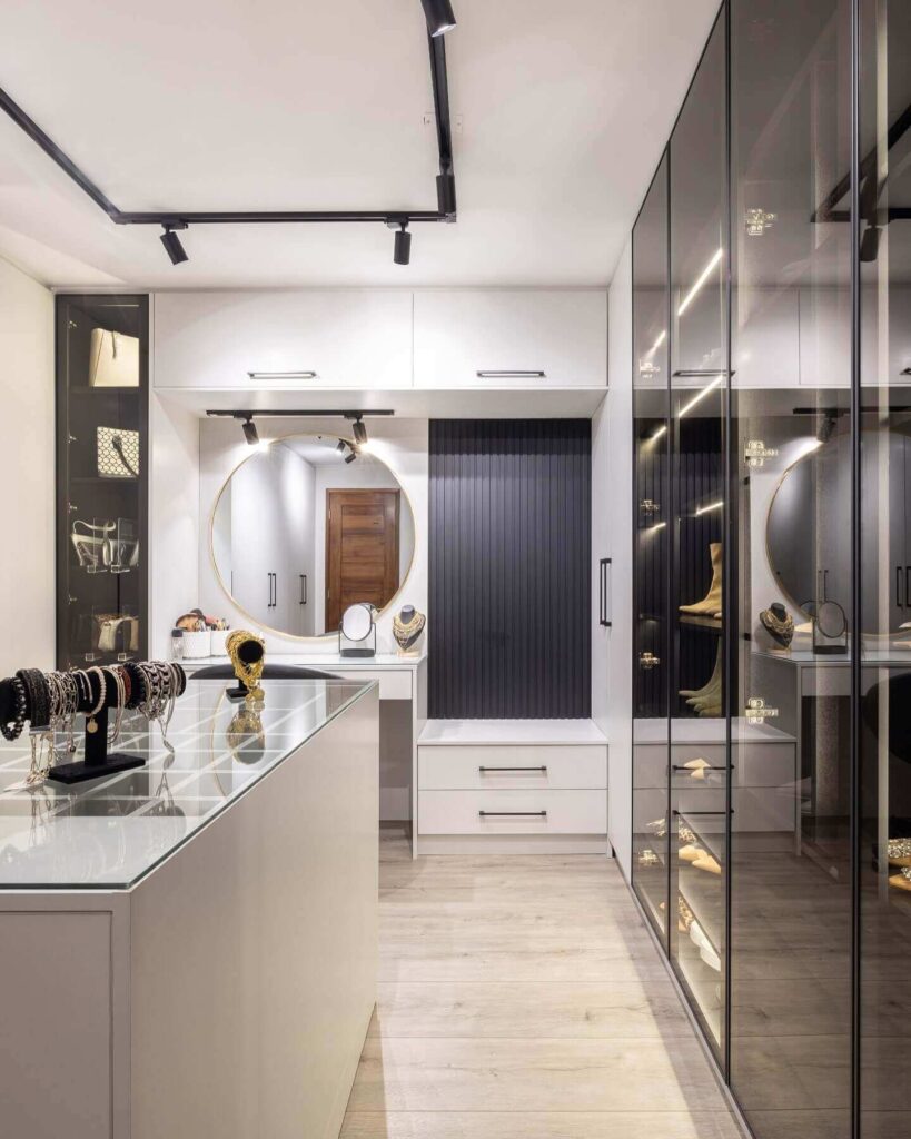 4. Go Sleek and Modern with Glass, Mirrors, and Jewelry Displays