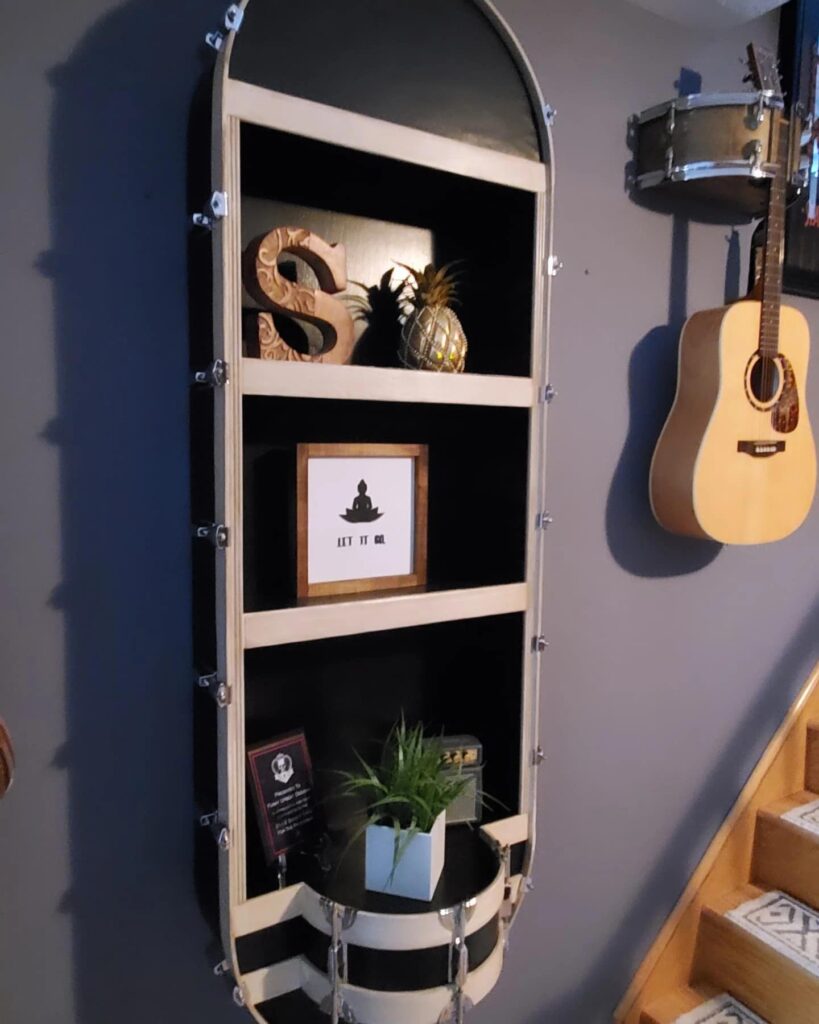 5. Industrial Chic with Pipe Bracket Shelves