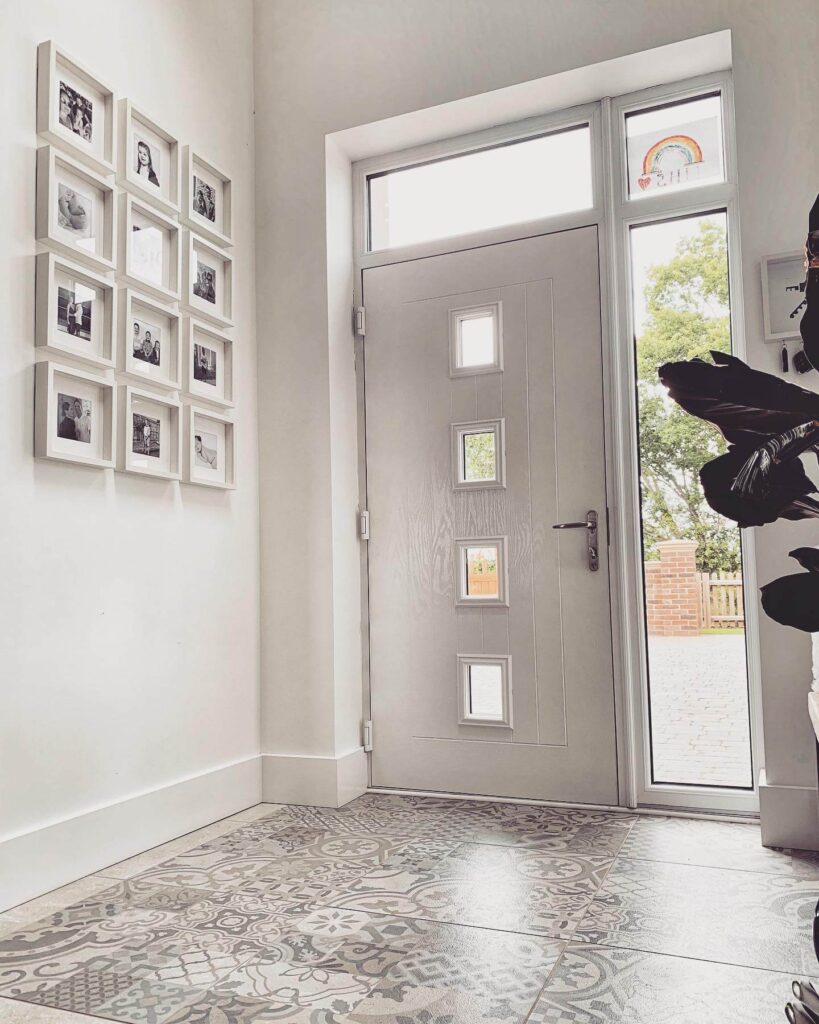 7. Minimalist Grid of Memories in a Bright Entryway