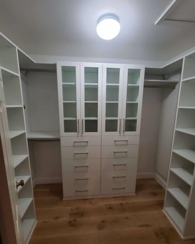 7. Balanced Storage with Glass Accents