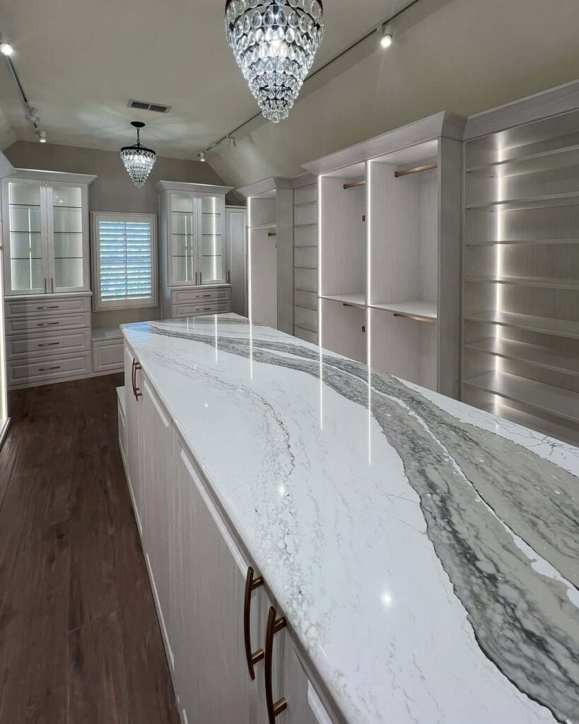 7. Illuminate with Glamorous Lighting and Sleek Surfaces
