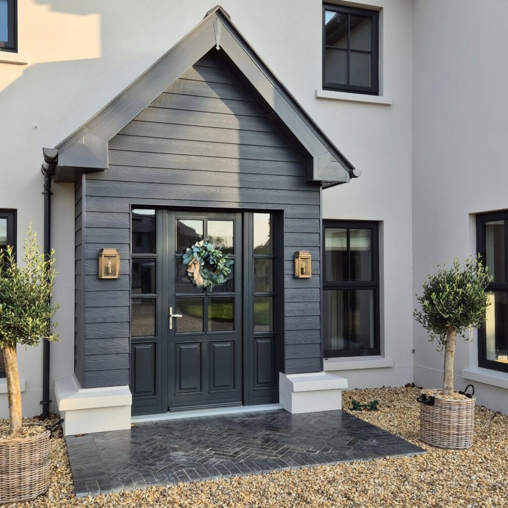 9. Dark Green Statement Door with Natural Surroundings