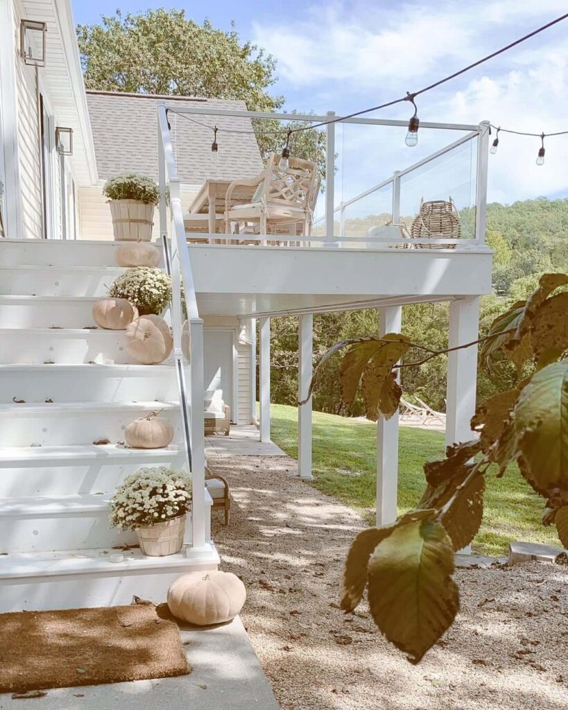 11. Elegant Entryway with Matching Fall Planters