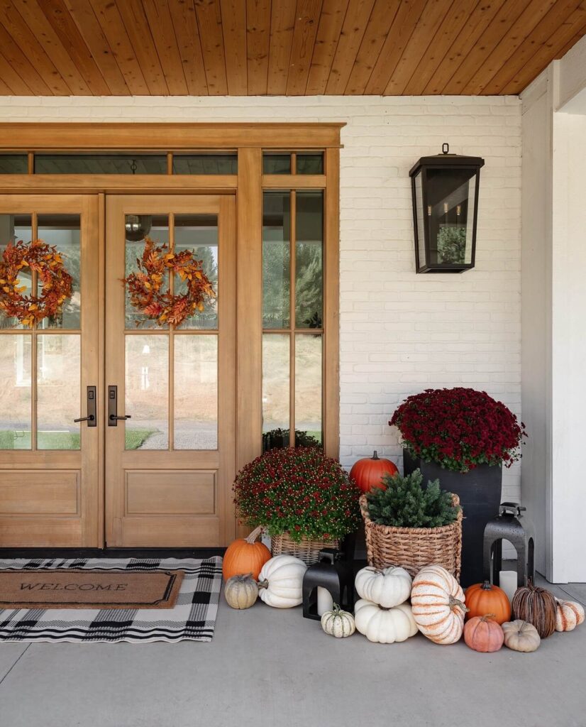 12. Minimalist Porch with Monochromatic Pumpkins