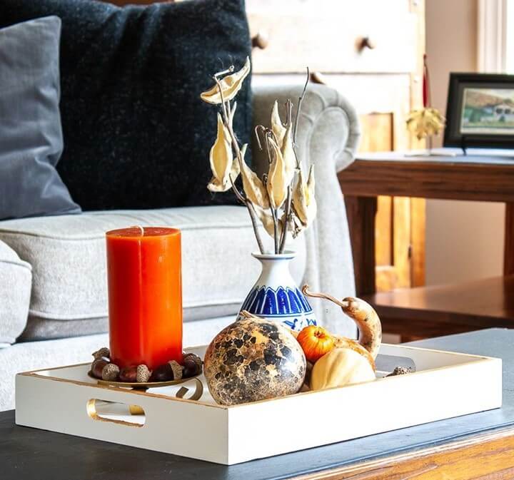 17. Earthy Fall Decor with Natural Wood and Candles