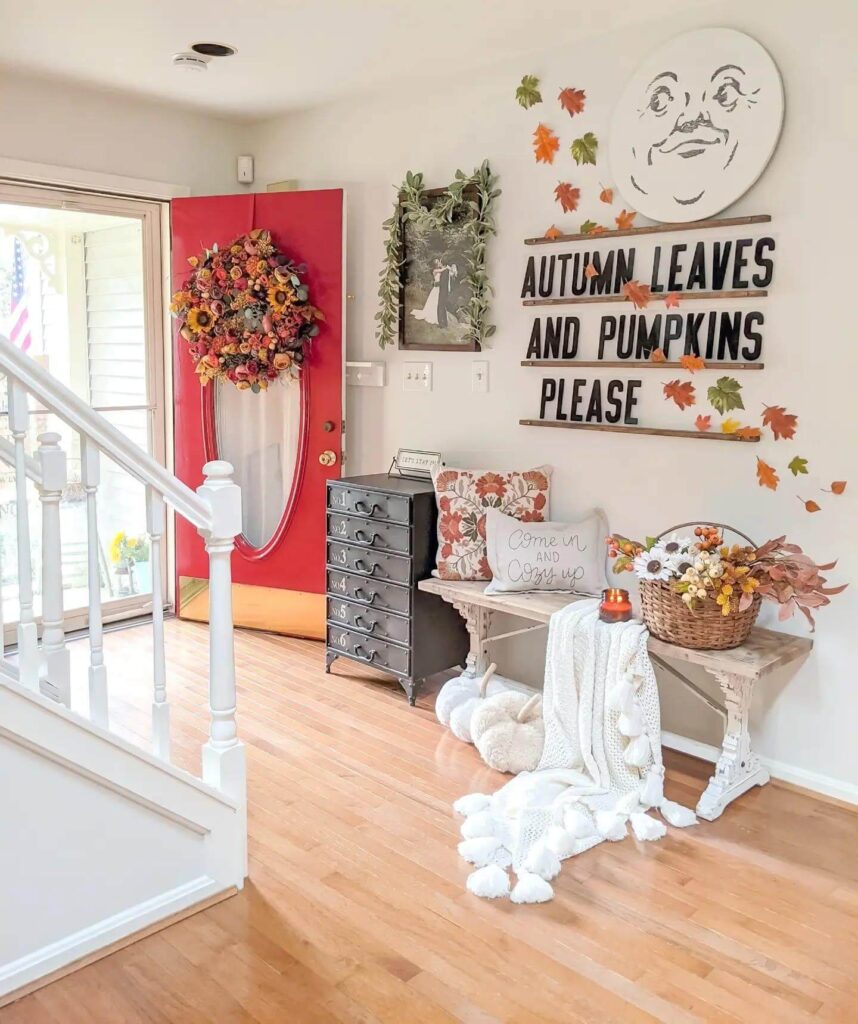 18. Fall Fireplace with Layered Wreaths and Cozy Charm