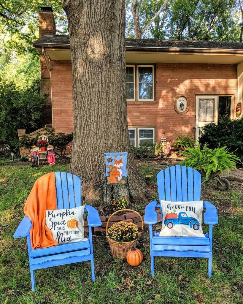 20. A Touch of Whimsy with Fall Gnomes or Figurines