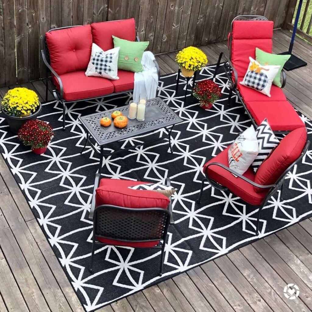 6. Cozy Porch Seating with Autumn Accents