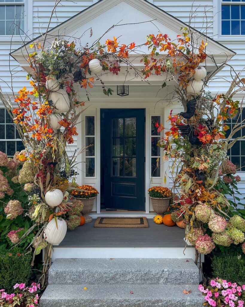9. Playful Porch with Layered Fall Signage