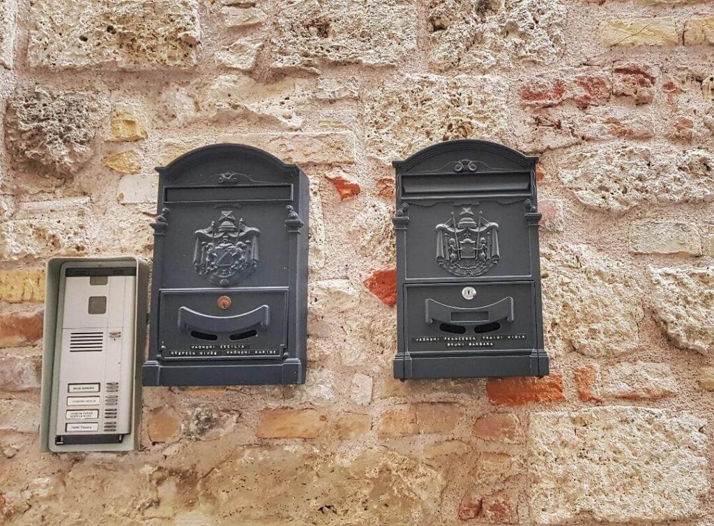 6. Coastal-Themed Mailbox with Nautical Details