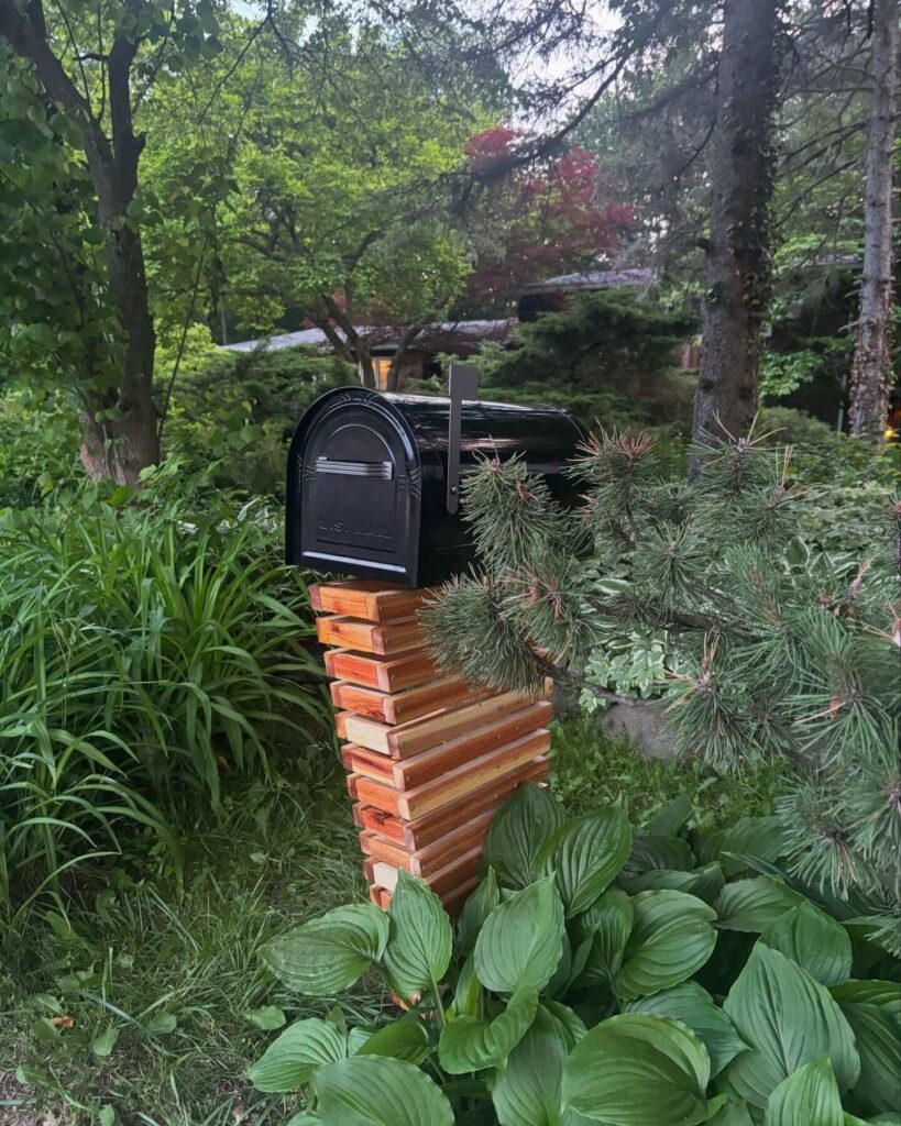 9. Artistic Hand-Painted Mailbox